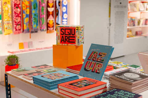 Some books displayed in a Kiblind shop